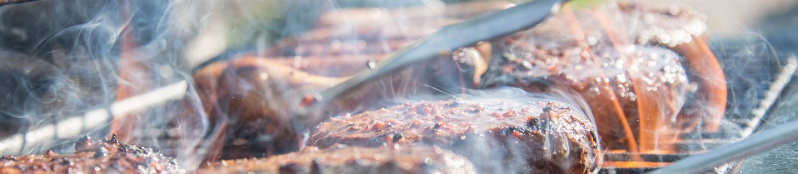 close-photography-of-grilled-meat-on-griddle-1105325